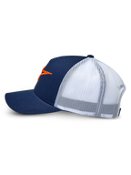 Alpinestars Ageless Trucker Hat, Navy Blue and White, side view profile, structured navy twill front with white poly mesh back, curved bill, featuring an orange 3D embroidered Astars logo, casual motorsport headwear