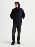 Alpinestars Speeder Resolve Windbreaker Jacket, Men's Lightweight Sportswear for Urban Use, Black, 100% Polyester, featuring an adjustable hood, mesh-lined interior, and signature Alpinestars chest branding. Full-length on-model view showing the windproof hooded jacket styled for casual everyday wear.