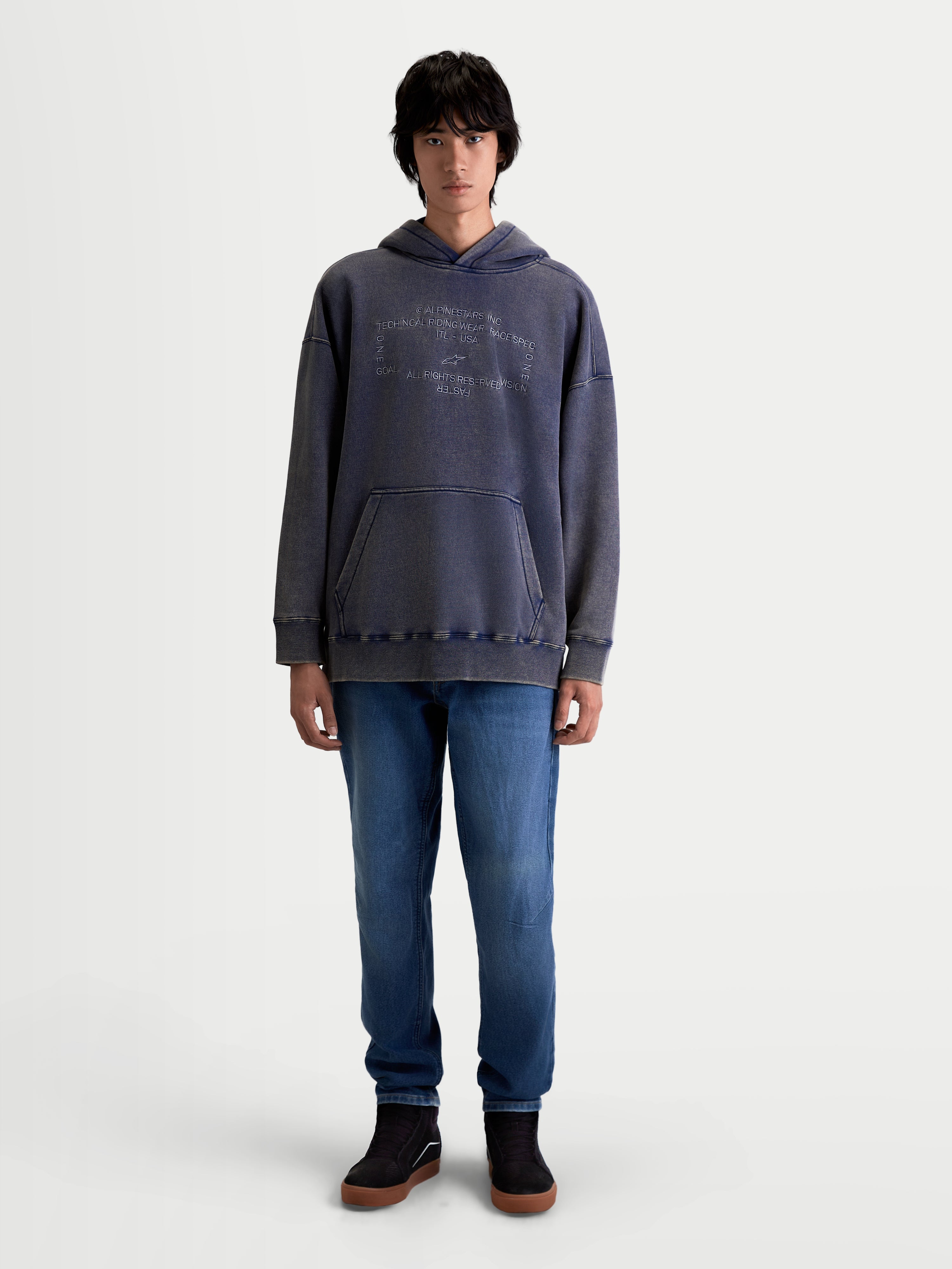 Alpinestars Infinite Washed Oversized Hoodie, Unisex Lifestyle Sportswear Pullover, Washed Navy Blue with a snow-wash finish, featuring a kangaroo pocket and embroidered chest logo, cotton-blend fleece construction.