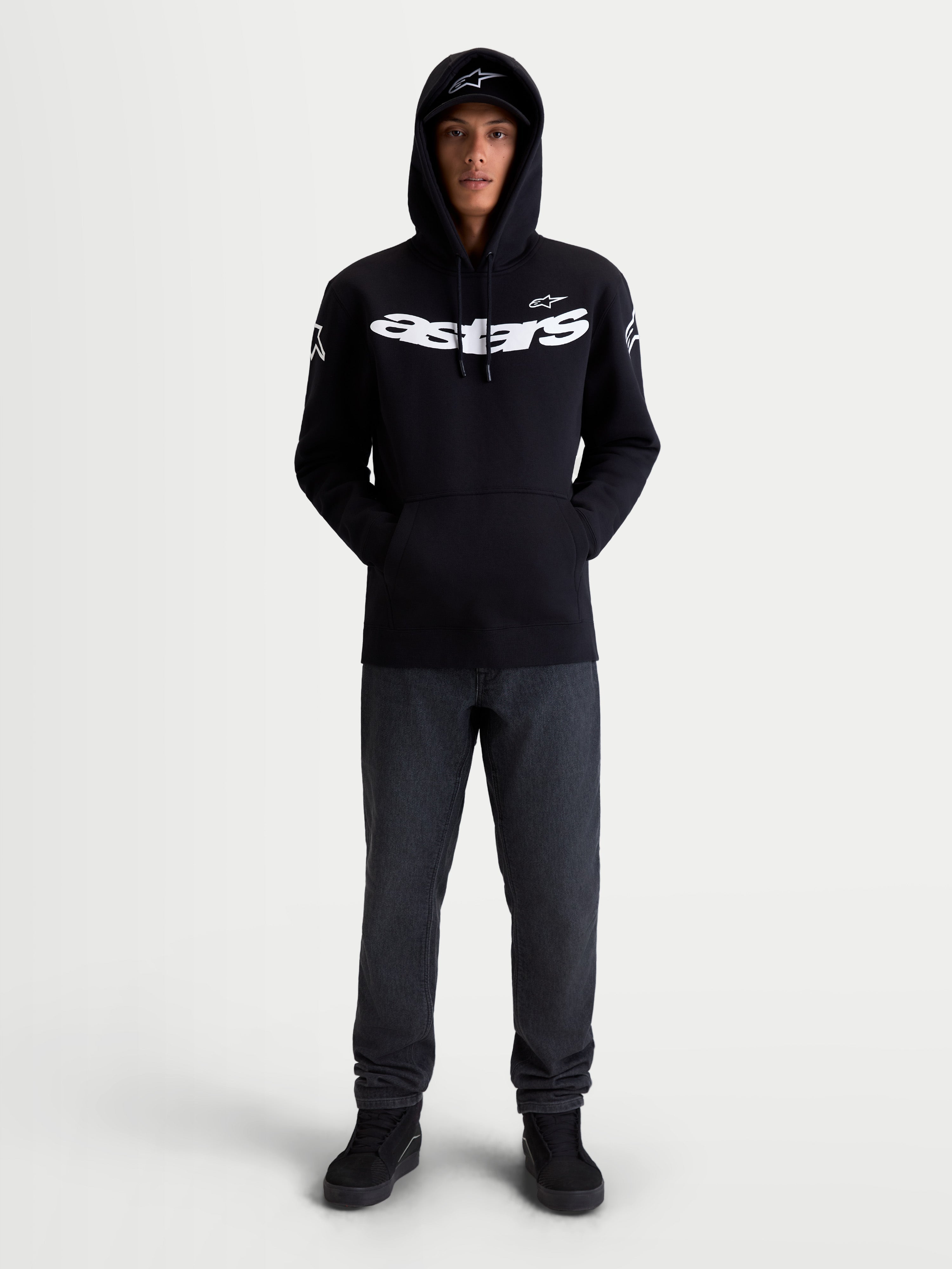 Alpinestars Velocifier Hoodie, Motorcycle Sportswear Pullover Fleece, Unisex, Black and White, Cotton and Recycled Polyester Blend, featuring bold Astars chest branding and shoulder logos, on-model front view for off-bike casual wear.