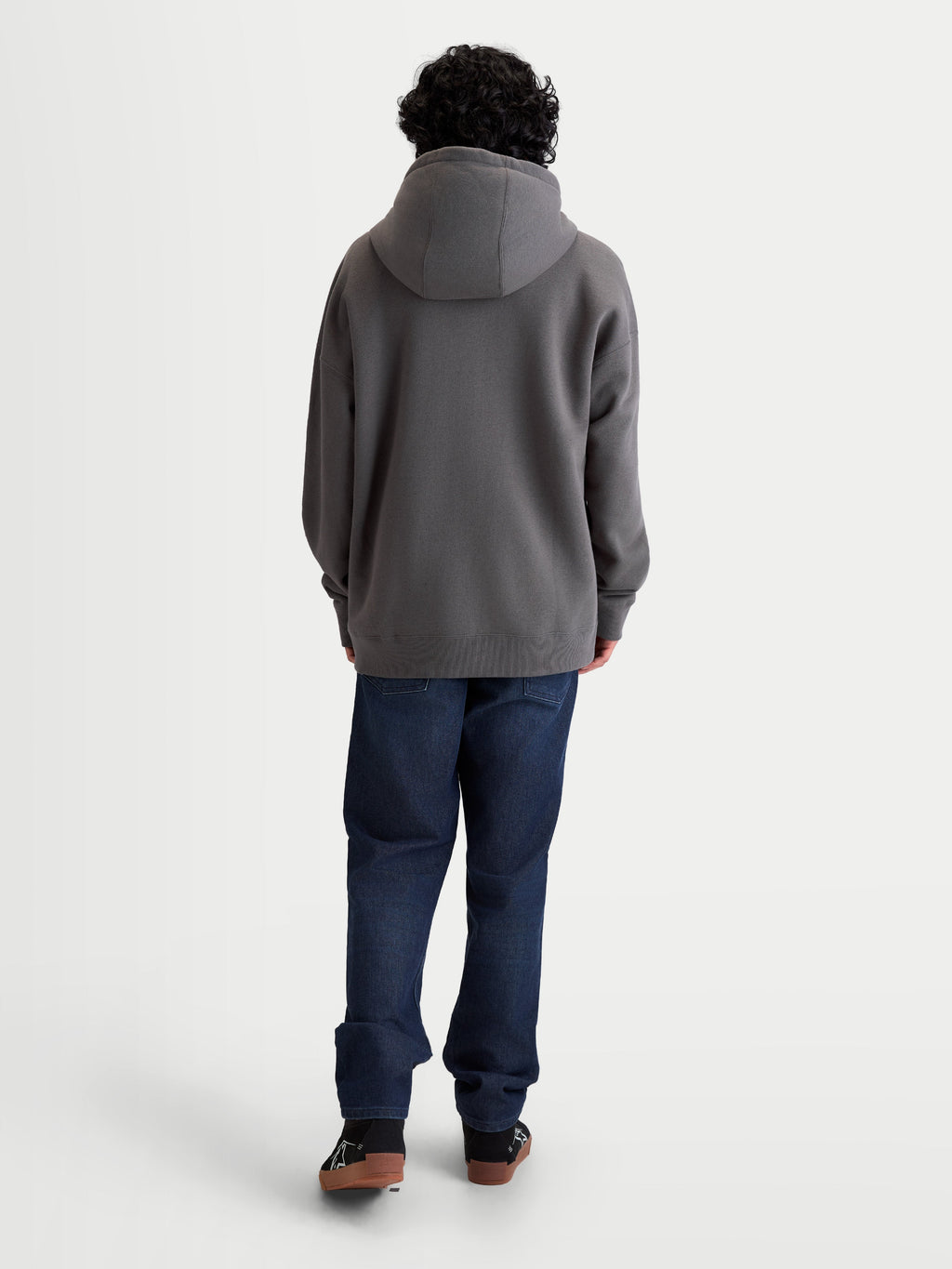 Alpinestars Entity Oversized Hoodie, Sportswear Zip-Up Fleece, Unisex, Charcoal Gray, Back View on Model showing Relaxed Fit, Self-Lined Hood, and Ribbed Cuffs, Cotton and Recycled Polyester Blend