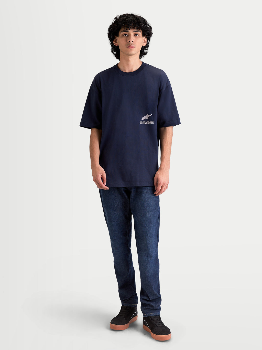 Alpinestars Institute Oversized CSF Tee, Men's Sportswear Short Sleeve T-Shirt, Navy Blue, features a small white front chest logo and relaxed oversized fit, constructed from a soft combed ring-spun cotton and polyester blend for everyday comfort.