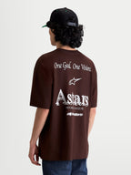 Alpinestars Post Oversized CSF Tee, Brown Short Sleeve Sportswear T-shirt, Men's Oversized Fit, Brown and White, Rear View featuring "One Goal. One Vision." and Astars World Wide Graphics, Casual Cotton-Poly Blend for Everyday Wear