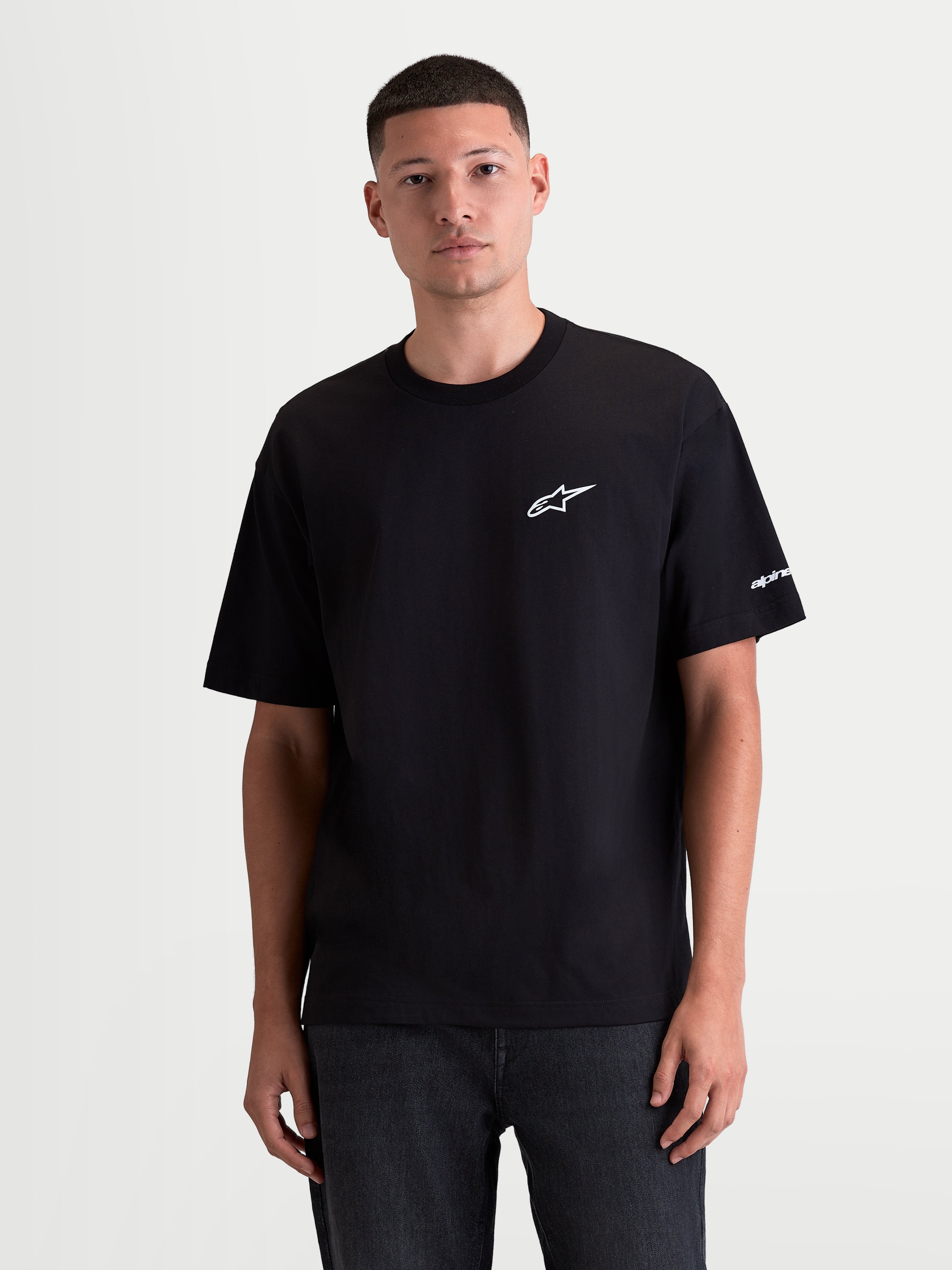 Alpinestars Mandate Oversized CSF Tee, Men's Short Sleeve Sportswear T-Shirt, Black with white puff-print Astars logo on chest, relaxed oversized fit, 60/40 cotton-polyester blend construction for everyday comfort.