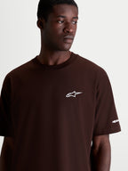 Alpinestars Mandate Oversized CSF Tee, Short Sleeve Casual Sportswear, Brown with White Astars Logo, Men's and Women's Relaxed Oversized Fit, Cotton-Poly Blend, On-Model Detail Shot.
