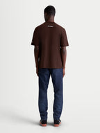 Alpinestars Mandate Oversized CSF Tee, Men's Short Sleeve Sportswear T-Shirt, Brown, Relaxed Oversized Fit, White Wordmark Logo on Back, Back View on Model