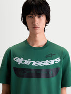 Alpinestars Singular CSF Tee, Men's Green Short Sleeve Sportswear T-Shirt featuring a curved white Alpinestars wordmark graphic and black band with the One Goal One Vision motto, premium cotton-poly blend for everyday comfort.