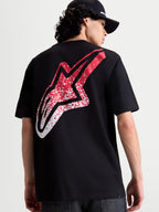 Alpinestars Meteor CSF Tee, Short Sleeve Sportswear T-Shirt, Black with large red and white MX-inspired gradient Astars logo on the back, premium cotton-poly blend, on-model view.