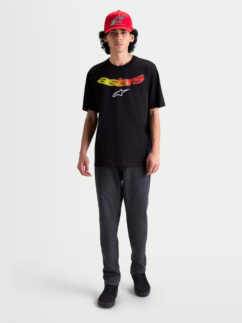 Alpinestars Elliptogrit CSF Tee, Men's Short Sleeve Sportswear T-shirt, Black with yellow and red gradient Astars wordmark logo, casual everyday apparel, cotton-poly blend.