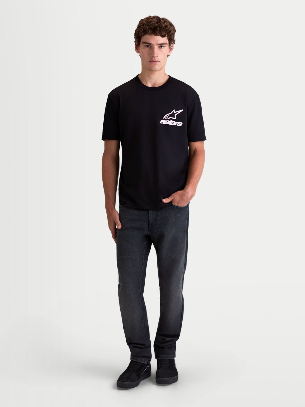 Alpinestars Lineout CSF Tee, Men's Short Sleeve Sportswear T-Shirt, Black with white and pink Astars logo graphic, on-model view, soft cotton-poly blend fabric.