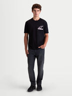 Alpinestars Lineout CSF Tee, Men's Short Sleeve Sportswear T-Shirt, Black with white and pink Astars logo graphic, on-model view, soft cotton-poly blend fabric.