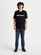 Alpinestars Race Wordmark CSF Tee, Casual Sportswear Short Sleeve T-Shirt, Black and White, featuring a front Alpinestars wordmark and sleeve Ageless logo, on-model front view.