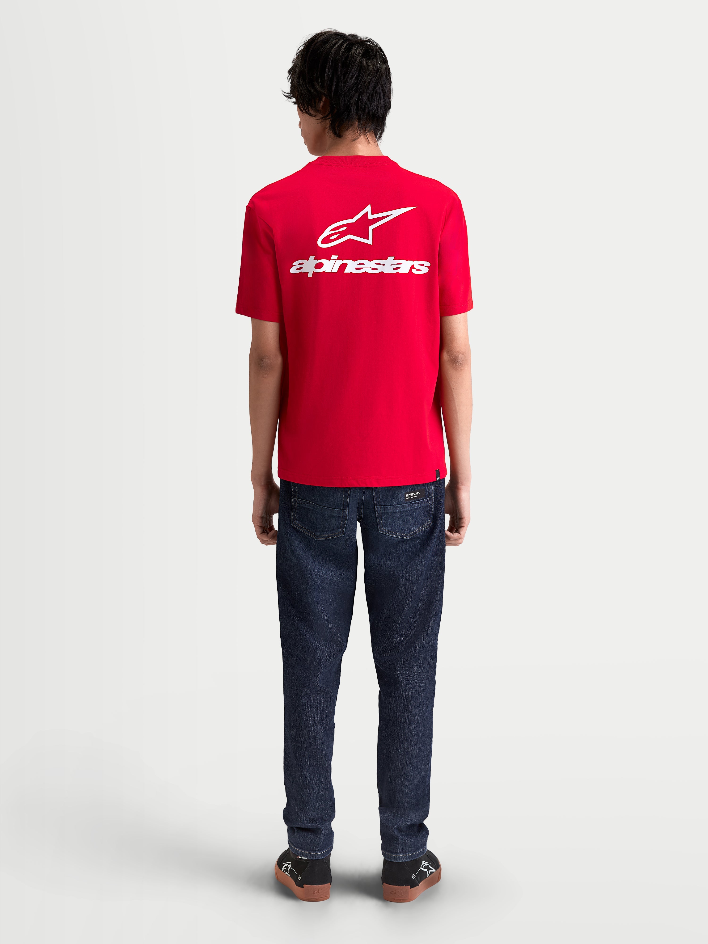 Alpinestars Combo Back CSF Tee, Red Short Sleeve Sportswear T-Shirt, featuring a large white Astars logo and wordmark graphic on the back, on-model view, premium cotton-poly blend for casual motorsport style.