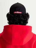 Alpinestars Lineout Hat, Sportswear Baseball Cap, Black and Red, Rear View on-model featuring embroidered astars logo, structured crown, twill fabric construction.
