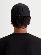 Alpinestars County Canvas Hat, Black Sportswear Cap, Rear View on Model, featuring Flex-back fit and small embroidered Astars logo on the back, Oxford peached canvas material for everyday comfort.