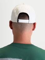 Alpinestars Combo Logo Snapback Hat, Off White Motorsport Sportswear Cap, Rear View on model, showing the adjustable snapback closure and branded back label, durable 100% cotton twill construction.