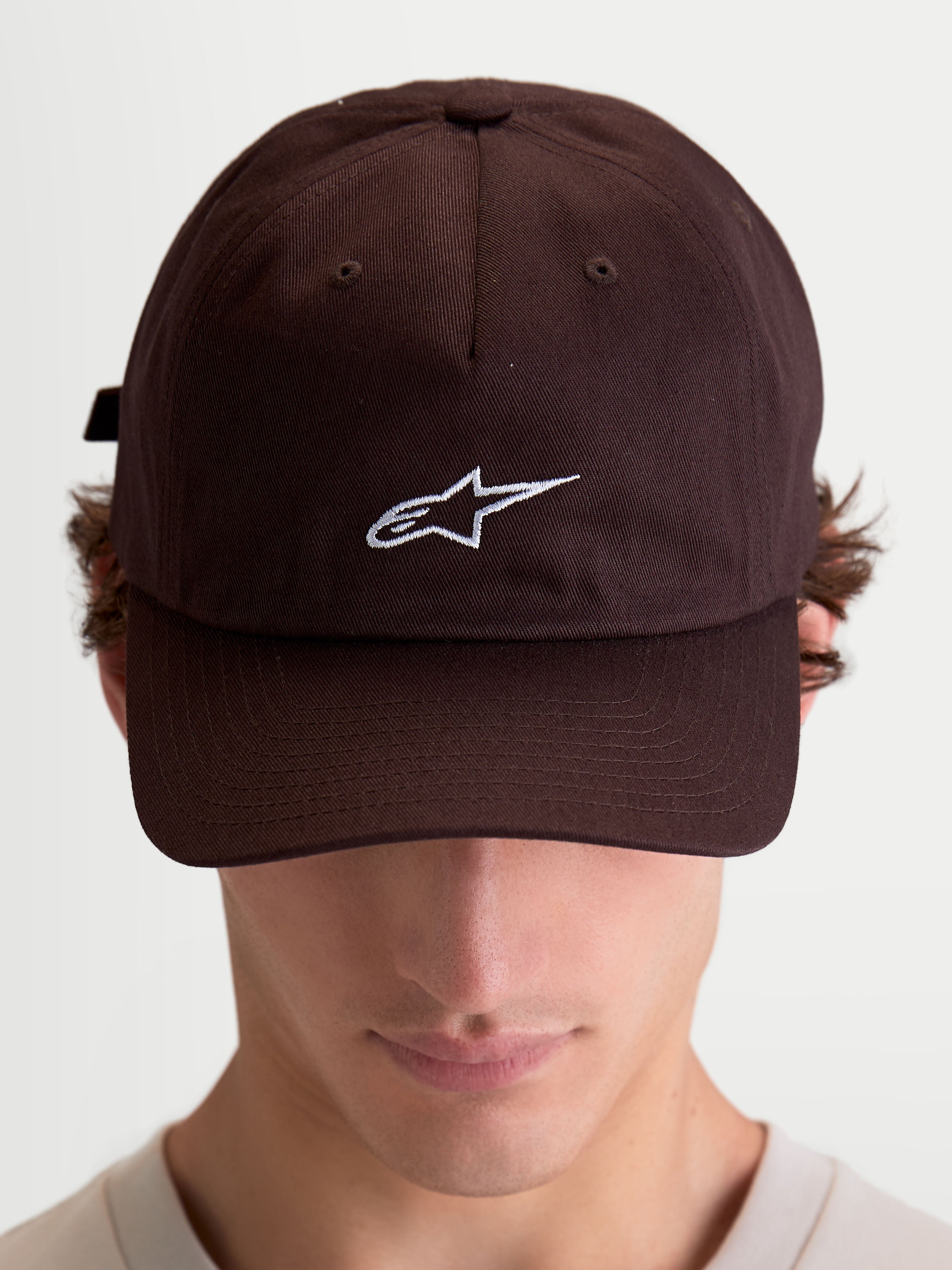 Alpinestars Dylan Dad Hat, Casual Sportswear Cap, Brown with white Astars logo embroidery, Curved Bill and Unstructured Low Crown, 100% Cotton Twill, On-Model Front View.