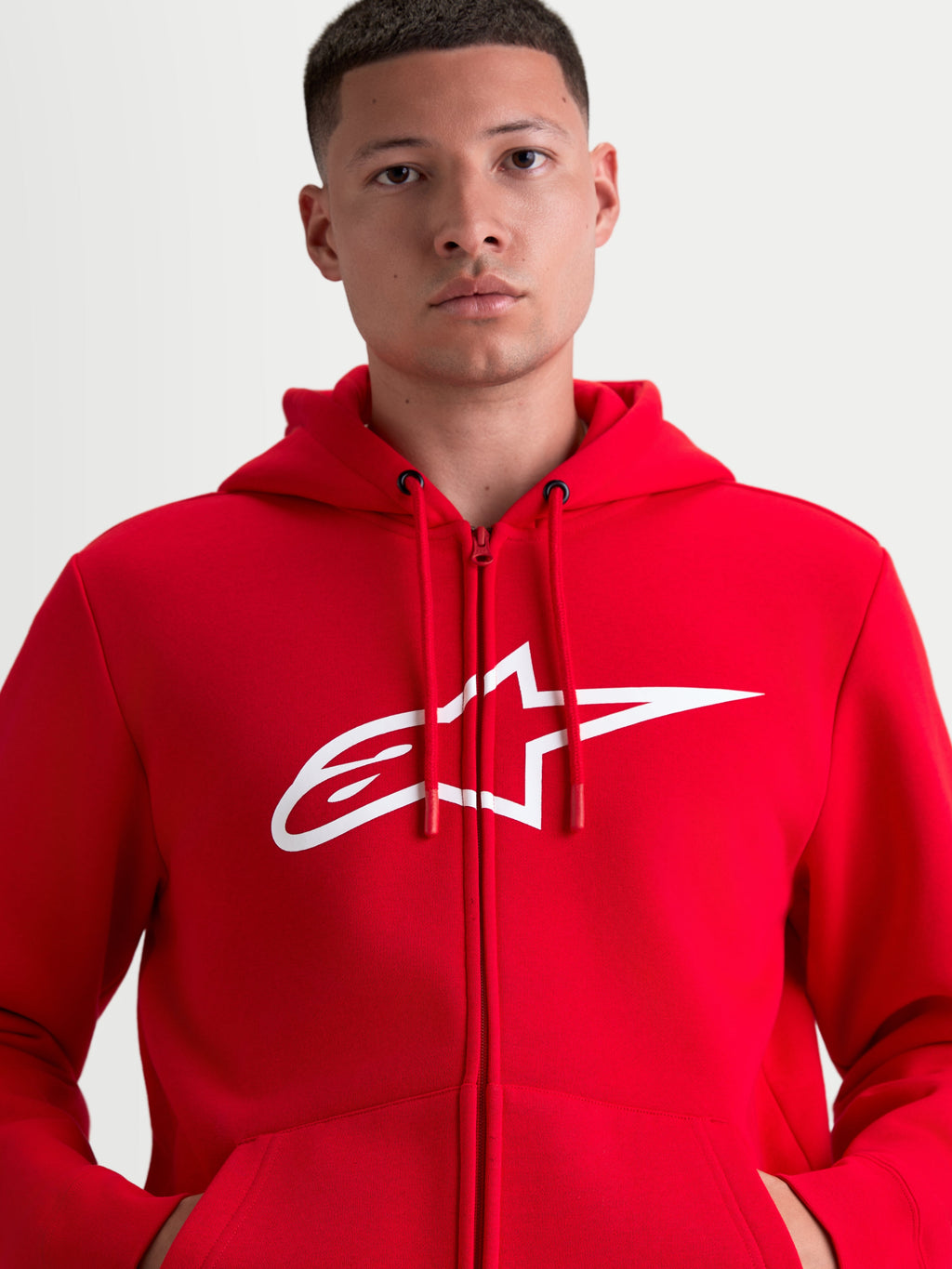 Alpinestars Ageless Zip V3 Hoodie, Sportswear Zip-Front Fleece, Men, Red and White, Cotton Blend, featuring a large Astars chest logo, hidden coil zipper, and hood with dipped drawcord tips.
