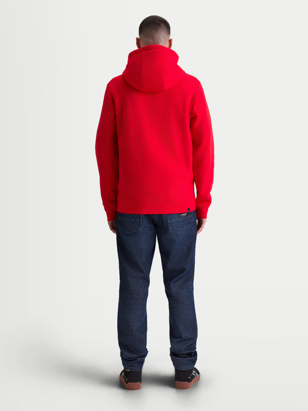 Alpinestars Ageless Zip V3 Hoodie, Red Sportswear Fleece for Men and Women, Back View on Model, featuring a comfortable hooded design with ribbed cuffs and hem, casual motorsport style.