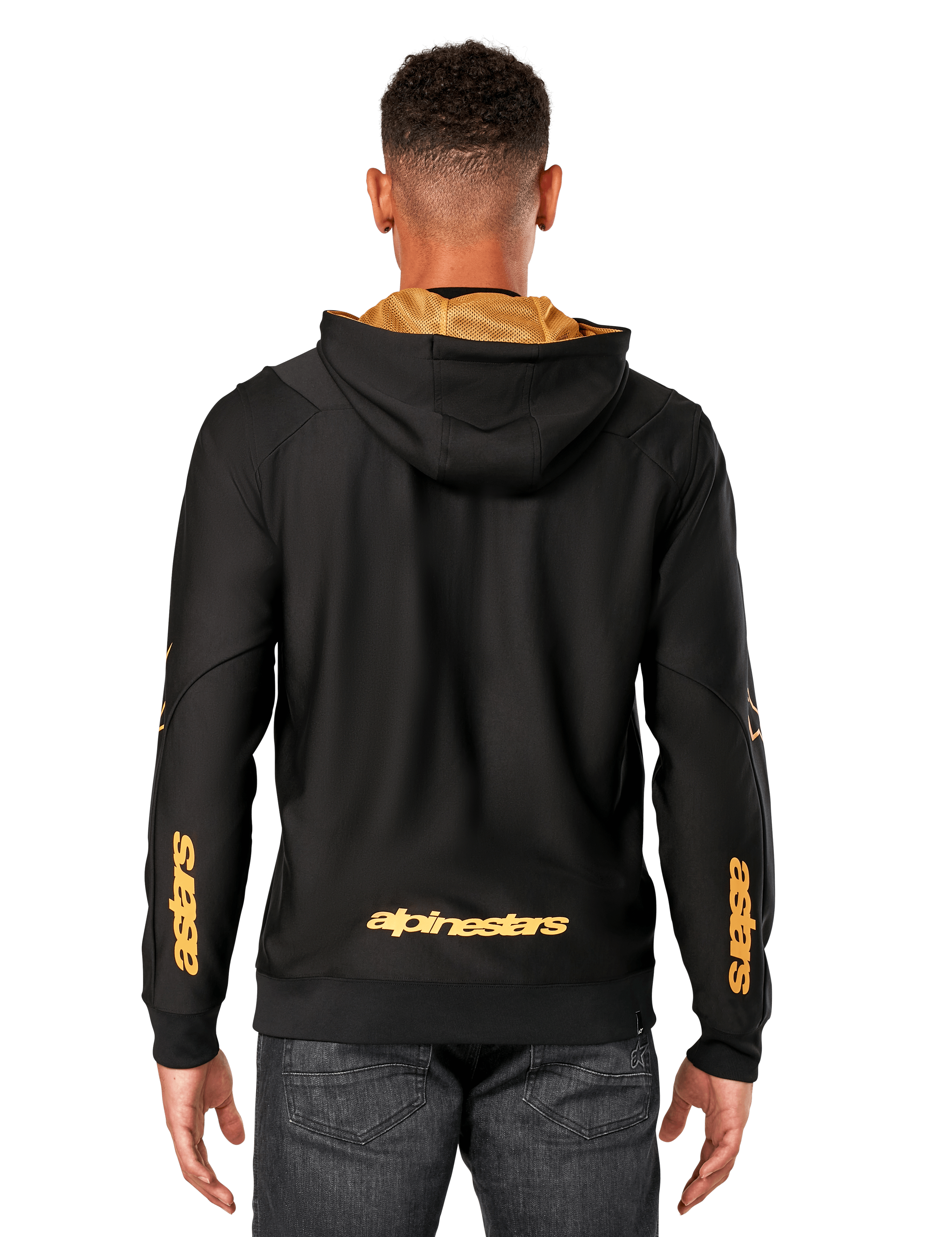 Alpinestars Sessions V3 Hoodie, back view, black with gold branding, gold 'alpinestars' wordmark on the lower back and 'astars' on the forearms, gold mesh-lined hood, casual motorsport-inspired streetwear