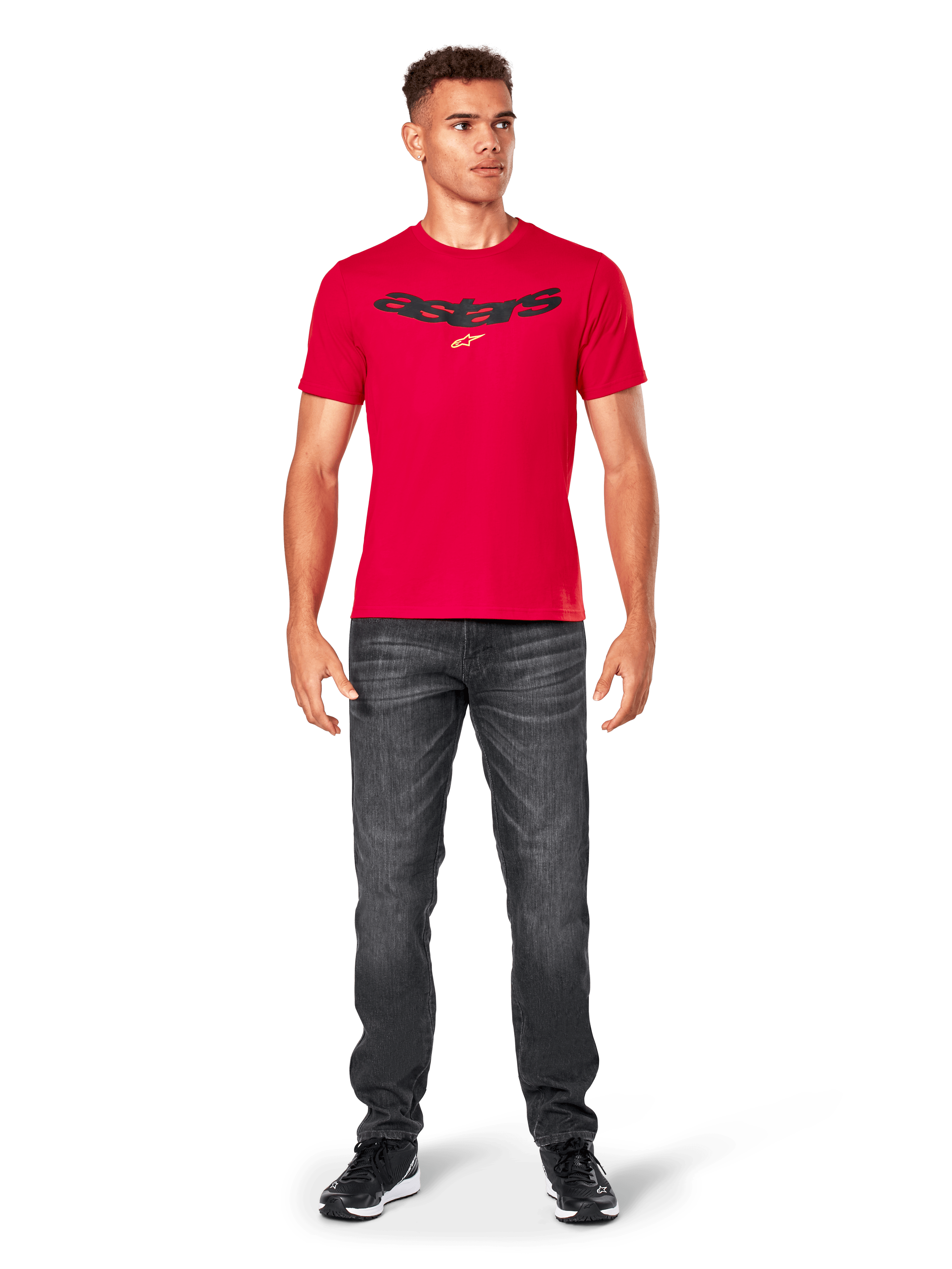 Alpinestars Elliptic CSF Tee, Red Short Sleeve T-Shirt, worn by model with dark gray jeans and black sneakers, black arched Astars logo and yellow star on chest, casual motorsport streetwear