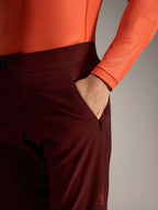 Alpinestars A-Dura Ride Shorts in Bordeaux, featuring a zippered side pocket and durable 4-way stretch MTB fabric.