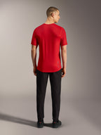 Red A-Dura Ride Short Sleeve Jersey, back view, featuring a dropped tail and lightweight performance fabric for MTB.