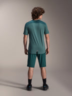 Alpinestars A-Dura Shorts and A-Dura Lipan SS Jersey, Dark Pine green, back view on a model, performance mountain bike apparel featuring short sleeve jersey and matching shorts, off-road cycling outfit