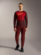 Alpinestars A-Dura Elite Jersey 2.0 Long Sleeve in Bordeaux, featuring a yellow chest logo and red stripes.