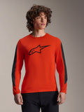 Alpinestars A-Dura Insert Astar Jersey - Long Sleeve, Spicy Orange with black Astar logo, featuring dark gray durable sleeve inserts, worn by a male model, performance MTB cycling apparel