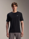 Alpinestars A-Dura Dri Wool Short Sleeve Jersey, Black, worn by male model, small white Alpinestars logo on chest, performance cycling apparel for MTB trail riding, moisture-wicking drirelease wool fabric