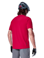 Alpinestars A-Aria Switch Short Sleeve Jersey, Red MTB cycling top, breathable polyester with drop tail shown from back.