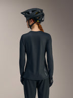 Black Stella A-Dura Ride Long Sleeve MTB Jersey back view, featuring subtle Alpinestars logo branding on the lower hem.