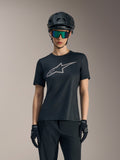 Black Women's Stella A-Dura Ride Jersey featuring a grey chest logo, styled with a mountain bike helmet and goggles.