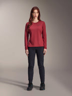 Alpinestars Stella A-Dura Thermal Pant, Women's MTB Pants, Black, worn with a maroon long-sleeve technical jersey, slim-fit thermal design for cold weather cycling, durable outer shell with brushed fleece lining