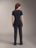 Alpinestars Women Stella A-Dura Dri Switch Short Sleeve Jersey, Black, rear view on a model, featuring a longer drop tail and technical mesh panels, paired with black pants, performance MTB cycling gear