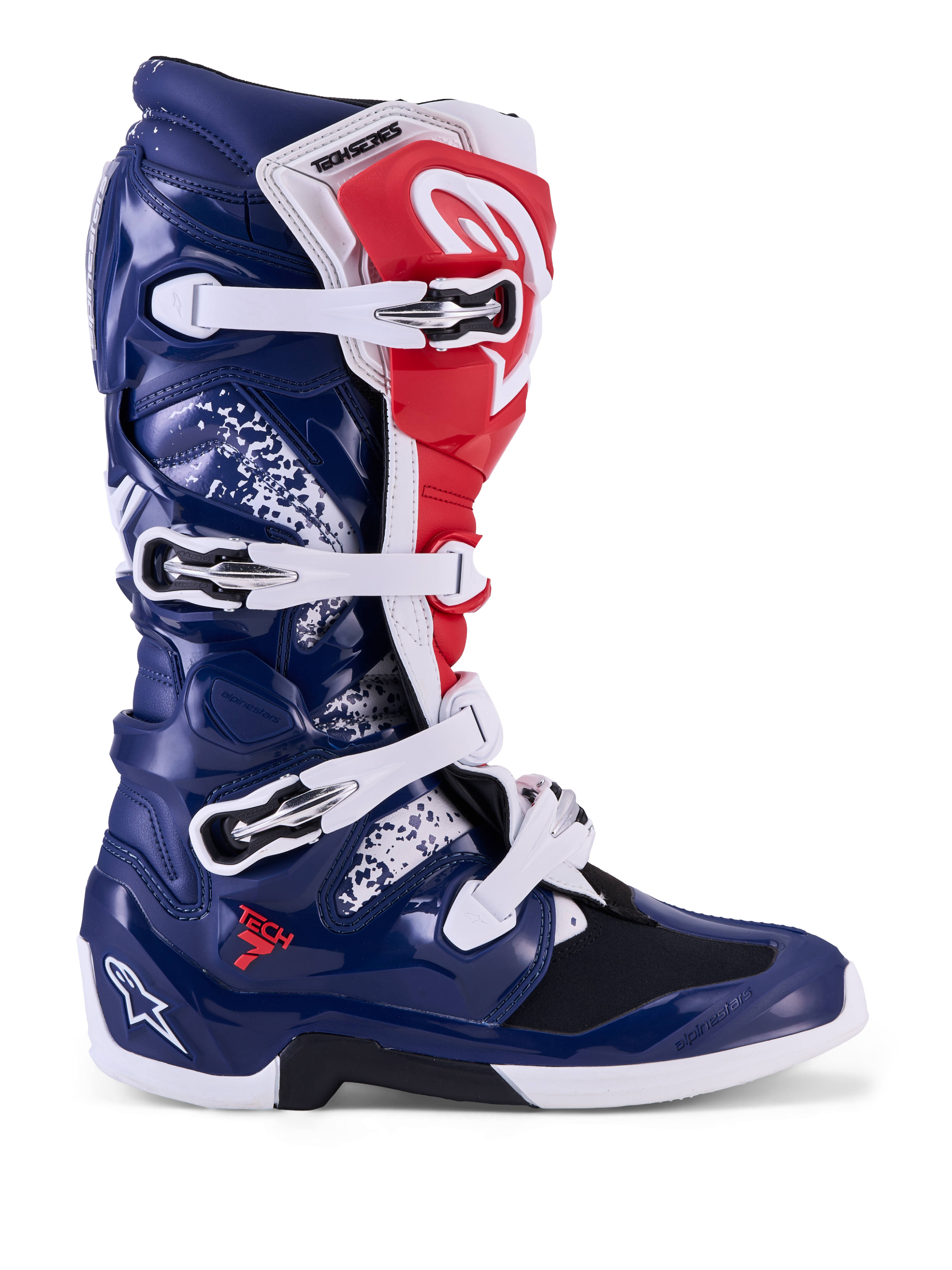 Alpinestars Tech 7 Unity Motocross Boots in red, white, and blue with protective TPU shell and buckle closure.