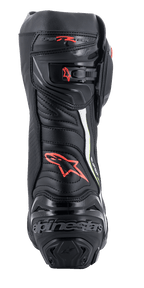 Alpinestars Supertech R Boots, high-performance racing motorcycle boots, rear view in black with red and yellow fluo accents, featuring TPU heel protection, a micro-adjustable ratchet closure, and signature branding.