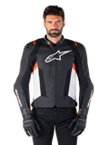 Alpinestars Missile V3 Leather Jacket, Black White and Red Fluo, premium racing sport jacket with bovine leather, featuring white chest logo and Alpinestars branding on sleeves, worn with black motorcycle gloves and pants