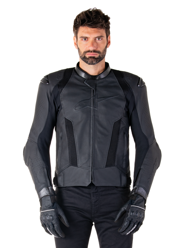 Alpinestars Missile V3 Airflow Leather Jacket, Black, Motorcycle Racing Jacket, worn by a model with black gloves and pants, featuring perforated leather panels, mesh ventilation, and external shoulder protectors, premium leather construction for sport riding.