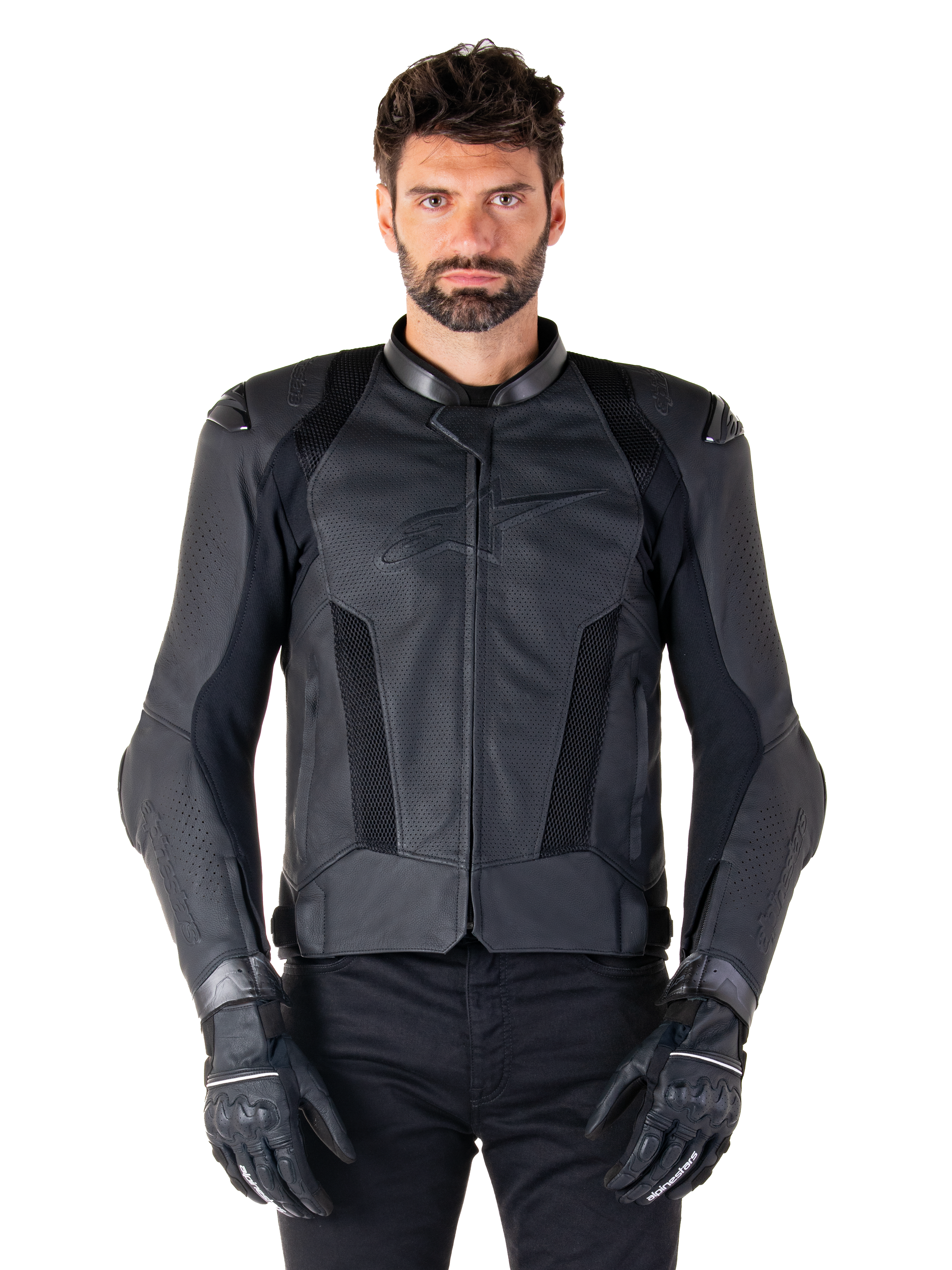 Alpinestars Missile V3 Airflow Leather Jacket, Black, Motorcycle Racing Jacket, worn by a model with black gloves and pants, featuring perforated leather panels, mesh ventilation, and external shoulder protectors, premium leather construction for sport riding.