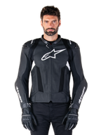 Alpinestars Missile V3 Airflow Leather Jacket, Black and White, motorcycle racing jacket with perforated leather ventilation panels, large white star logo on chest, worn with matching gloves, sporty protective design