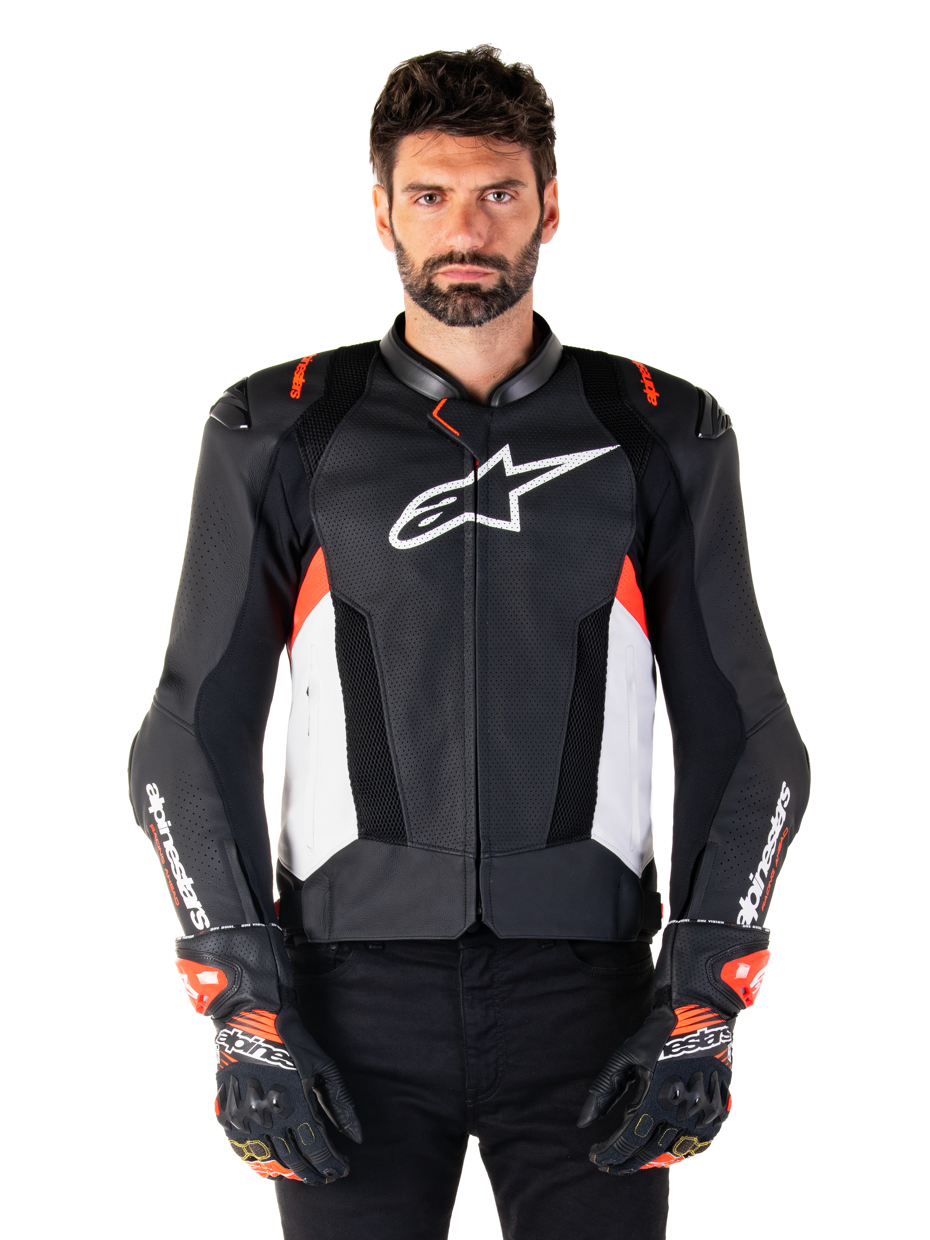 Alpinestars Missile V3 Airflow Leather Jacket, Motorcycle Racing Jacket, Black and White with Red Fluo accents, perforated ventilation panels, white star logo on chest, worn with black and red gloves, premium leather construction