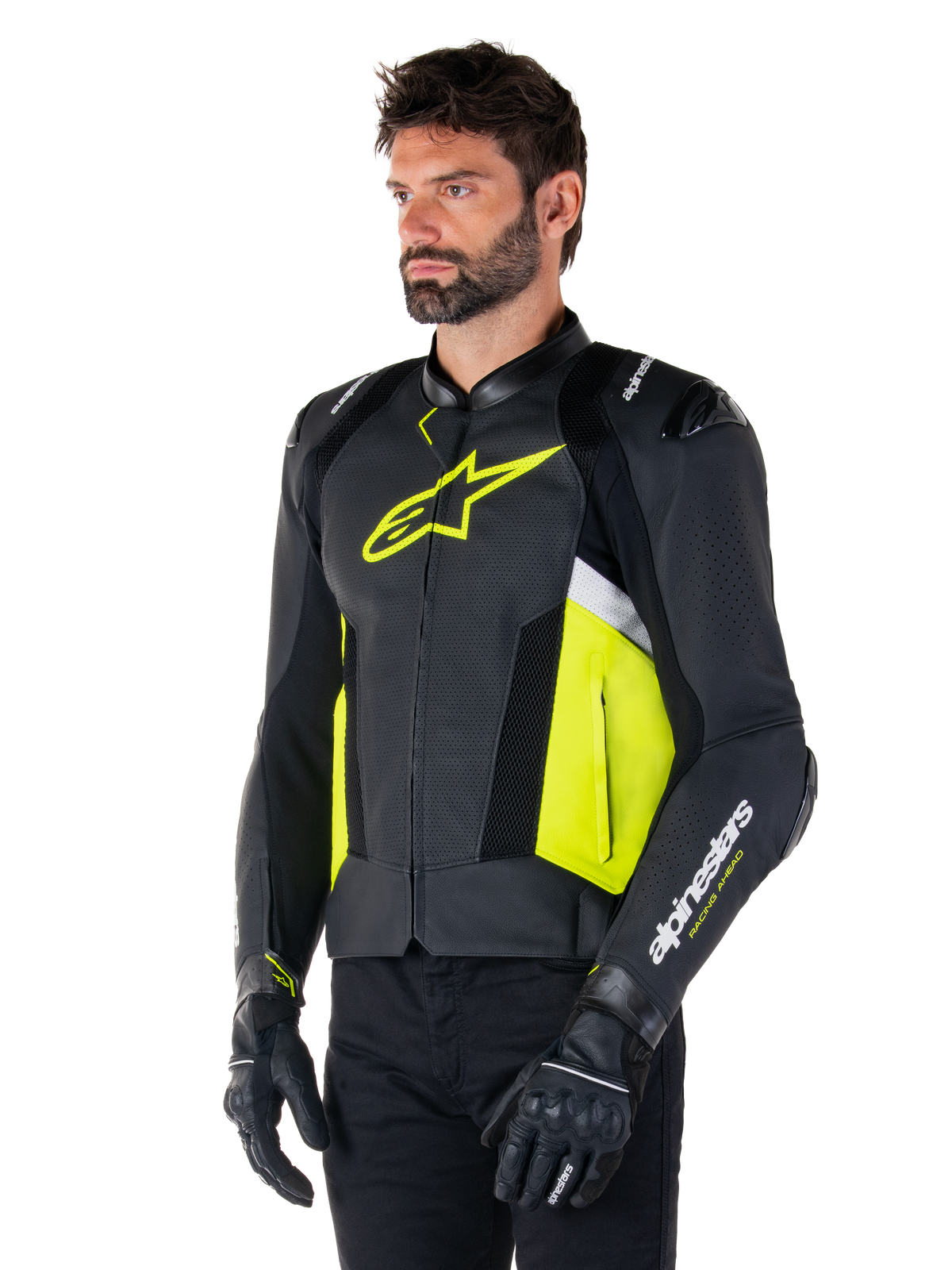 Male model wearing Alpinestars Missile V3 Airflow Leather Jacket, Black with Yellow Fluo and White accents, featuring perforated leather for maximum ventilation, bold yellow logo on the chest, paired with black gloves and pants, sport-style racing motorcycle gear