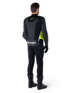 Alpinestars Missile V3 Airflow Leather Jacket, Black Yellow Fluo White, rear view on rider, featuring perforated leather back panels, yellow Alpinestars logo, and white accents, worn with black riding pants and boots