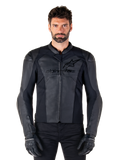 Alpinestars Faster V3 Leather Jacket, Black Motorcycle Jacket, premium leather with HRSF stretch panels, sleek sport fit, reinforced shoulders with protectors, worn with black gloves, professional gear for road riding