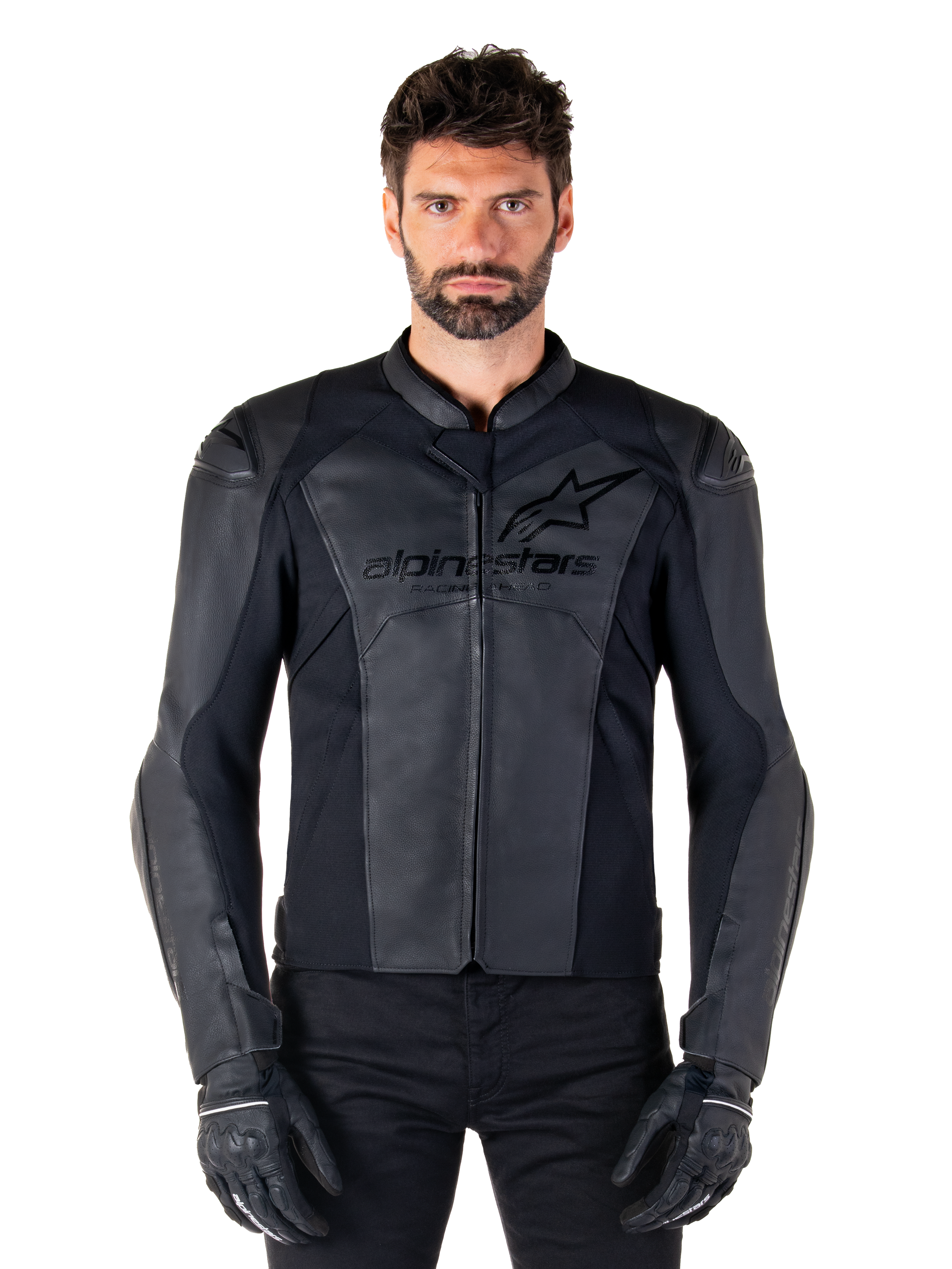 Alpinestars Faster V3 Leather Jacket, Black Motorcycle Jacket, premium leather with HRSF stretch panels, sleek sport fit, reinforced shoulders with protectors, worn with black gloves, professional gear for road riding