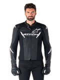 Alpinestars Faster V3 Airflow Leather Jacket, Black motorcycle riding jacket with white accents, perforated leather panels for ventilation, Alpinestars logo on chest, worn with black gloves, sport-derived leather construction