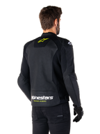 Alpinestars Faster V3 Airflow Leather Jacket, Black White and Yellow Fluo, rear view, featuring a large perforated leather back panel for ventilation, yellow star logo on the collar, and white Alpinestars branding with yellow 'Racing Ahead' text on the lower hem, sport motorcycle riding gear