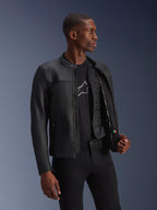 Alpinestars Blacktrack Leather Jacket, black bovine leather, unzipped on a model showing the thermal vest.